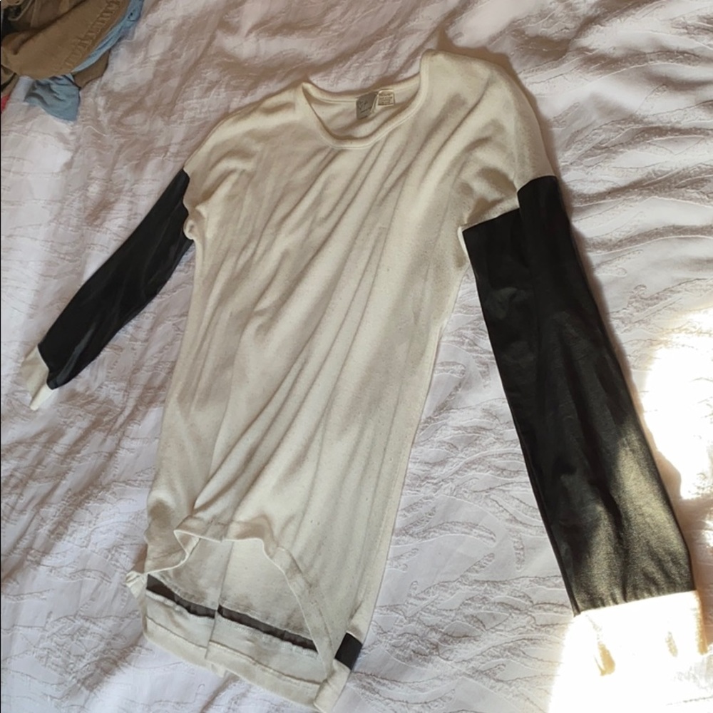 Long sleeved white shirt w/ leather on sleeve